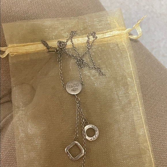 Tiffany & Co. Silver Charm Necklace - Picture 1 of 5